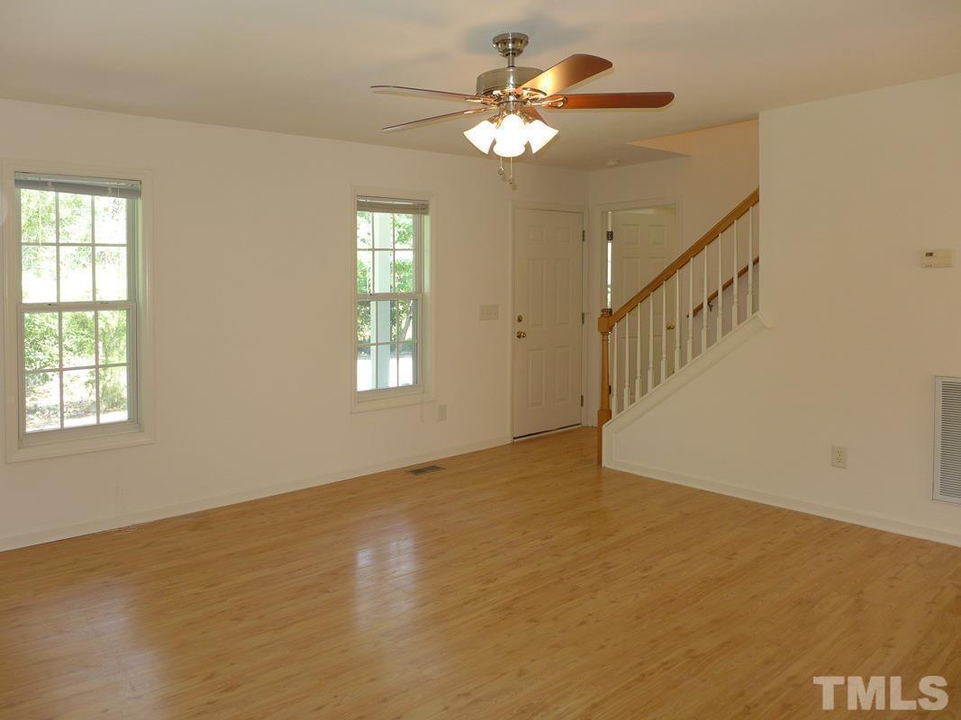 304 Davie Road Carrboro, NC 27510 - Photo 4 of 18 a view of an empty room with a window