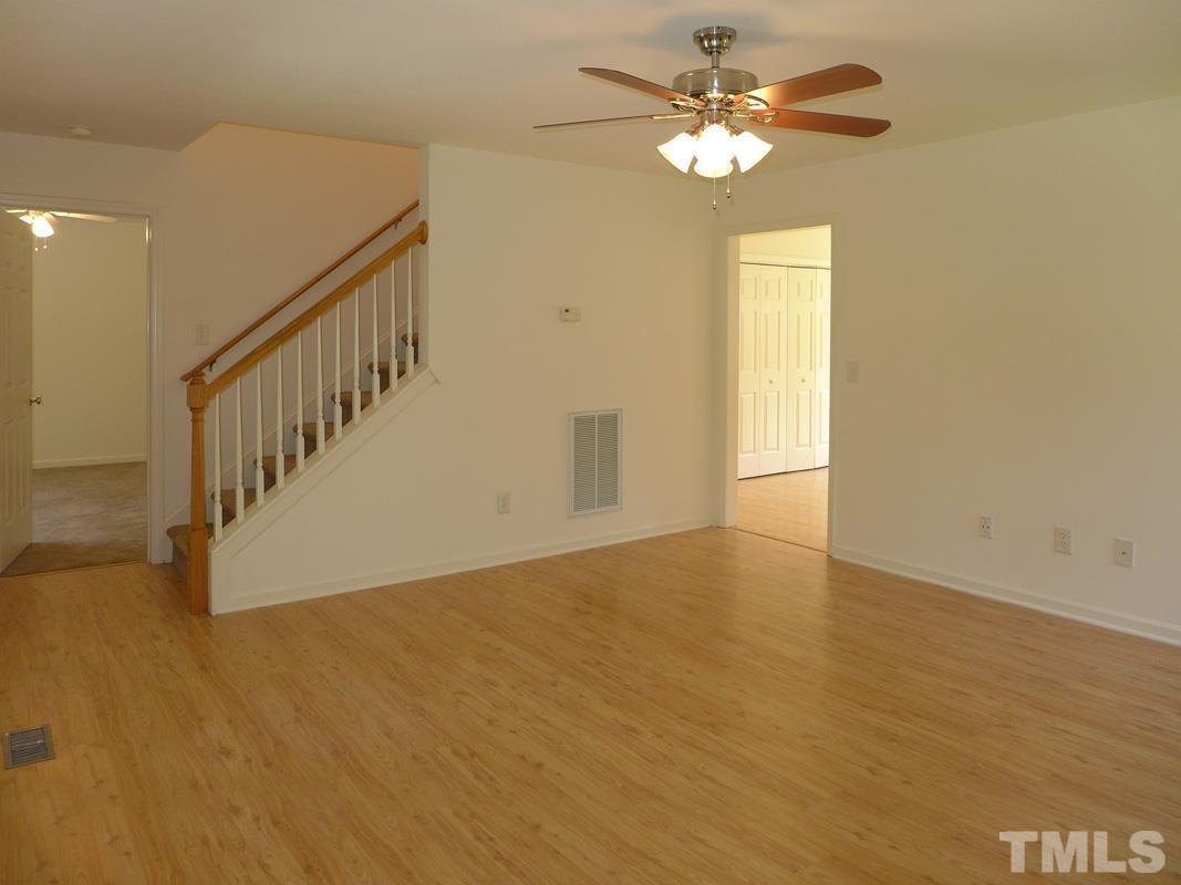 304 Davie Road Carrboro, NC 27510 - Photo 5 of 18 a view of an empty room with a window