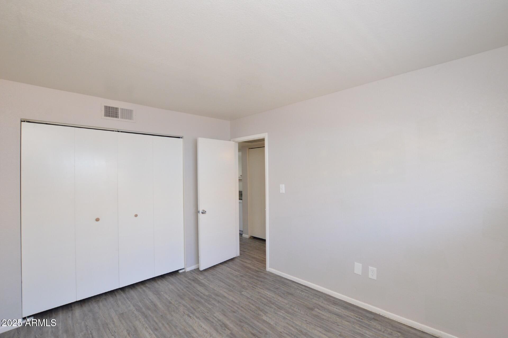 3004 East Waltann Lane, Unit 7 Phoenix, AZ 85032 - Photo 11 of 12 a view of an empty room