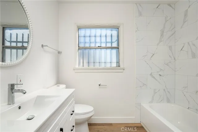 a bathroom with a sink and a bathtub