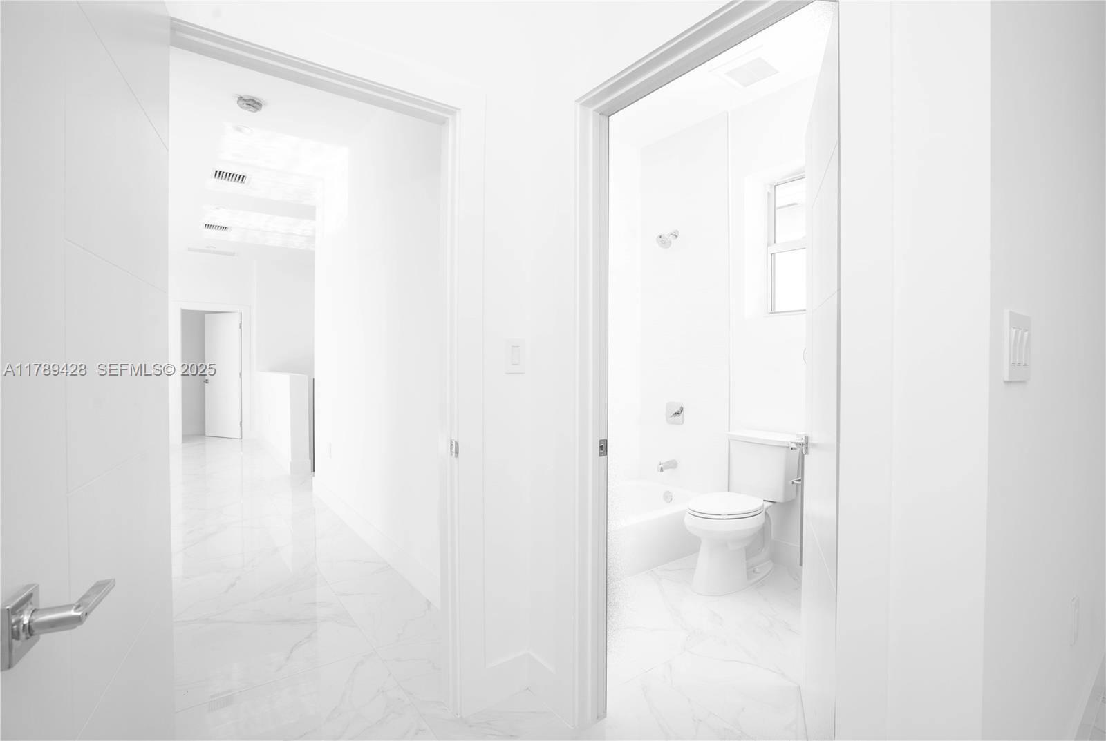 900 Southwest 24th Road Miami, FL 33129 - Photo 19 of 27 a bathroom with a toilet