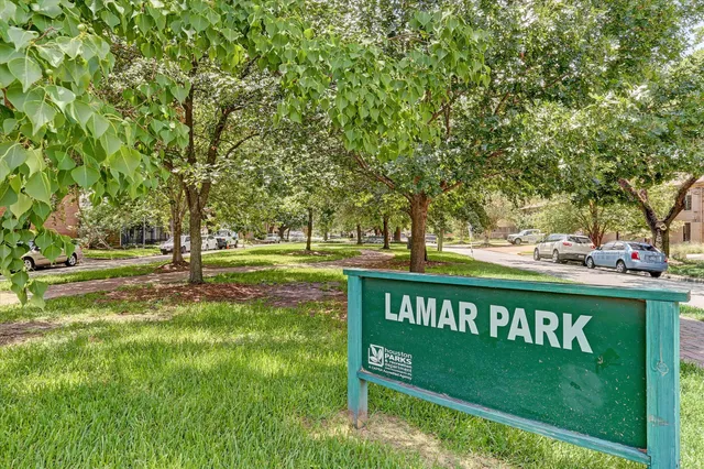 a view of park with sign board