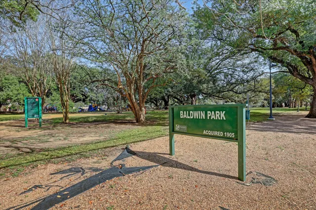 a sign board with parking space
