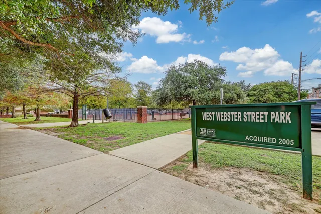 a sign on the side of the road