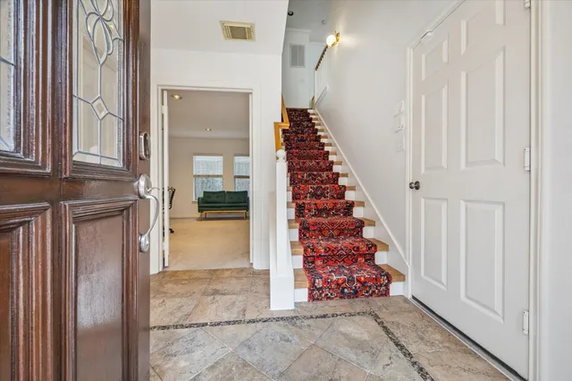 a view of entryway with wooden floor