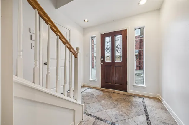 a view of an entryway with staircase