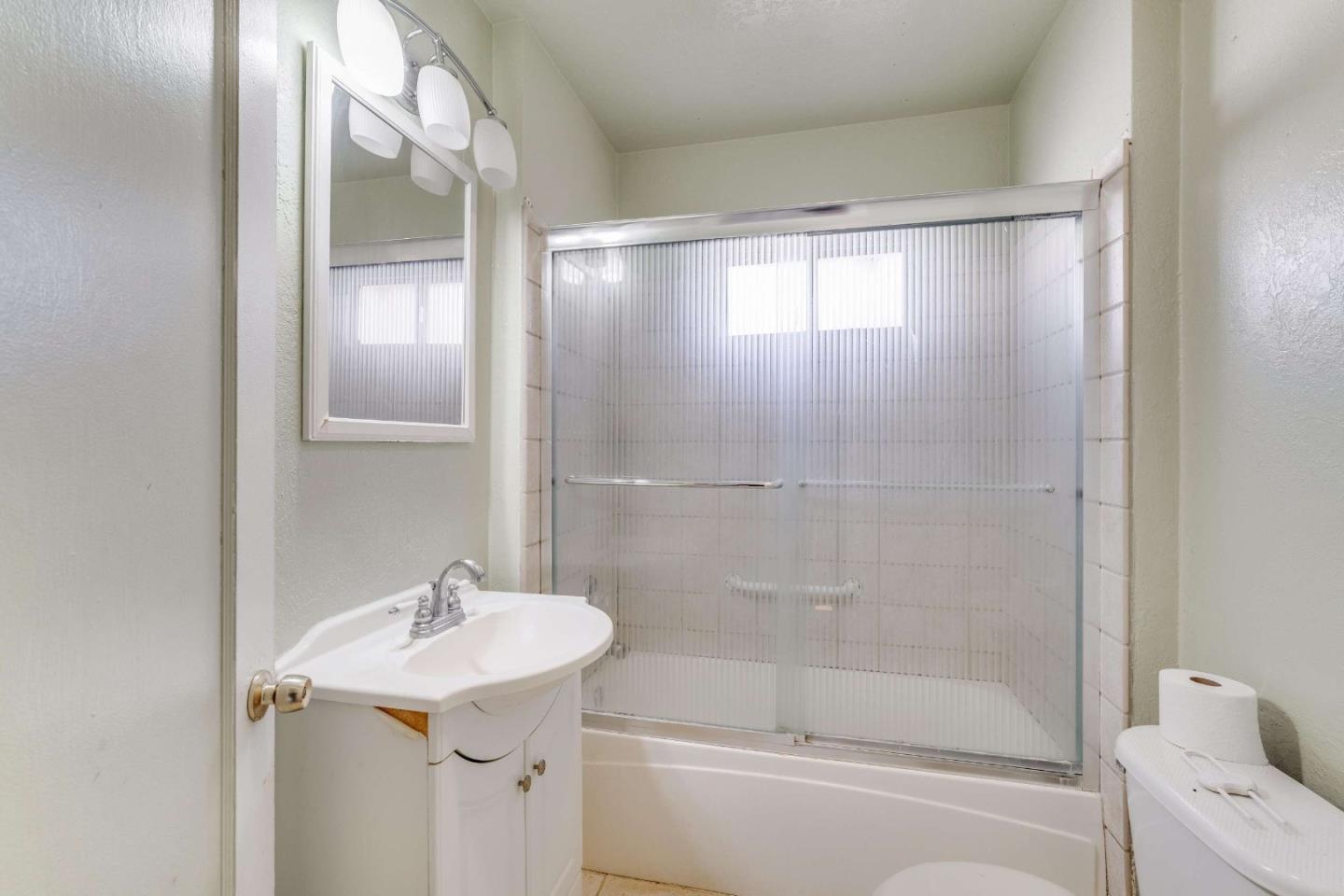 1 Spruce Street Vallejo, CA 94591 - Photo 27 of 35 a bathroom with a sink toilet and shower