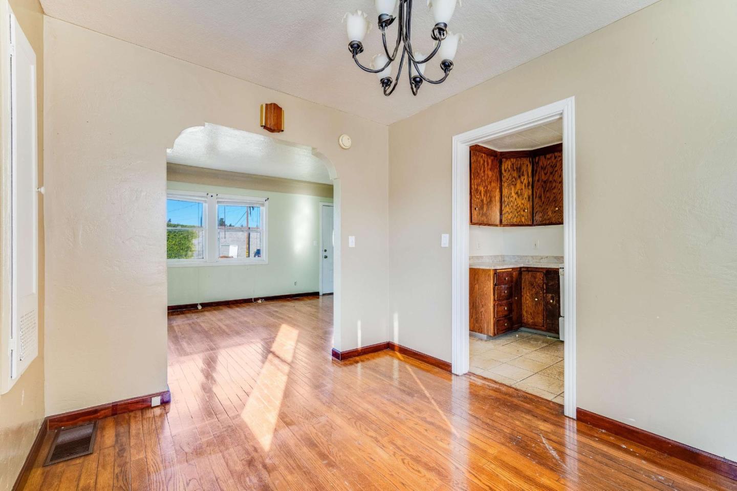 1 Spruce Street Vallejo, CA 94591 - Photo 10 of 35 a view of a hallway with wooden floor and closet