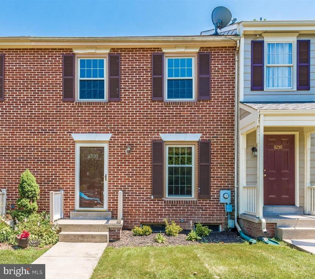 a front view of a house having yard