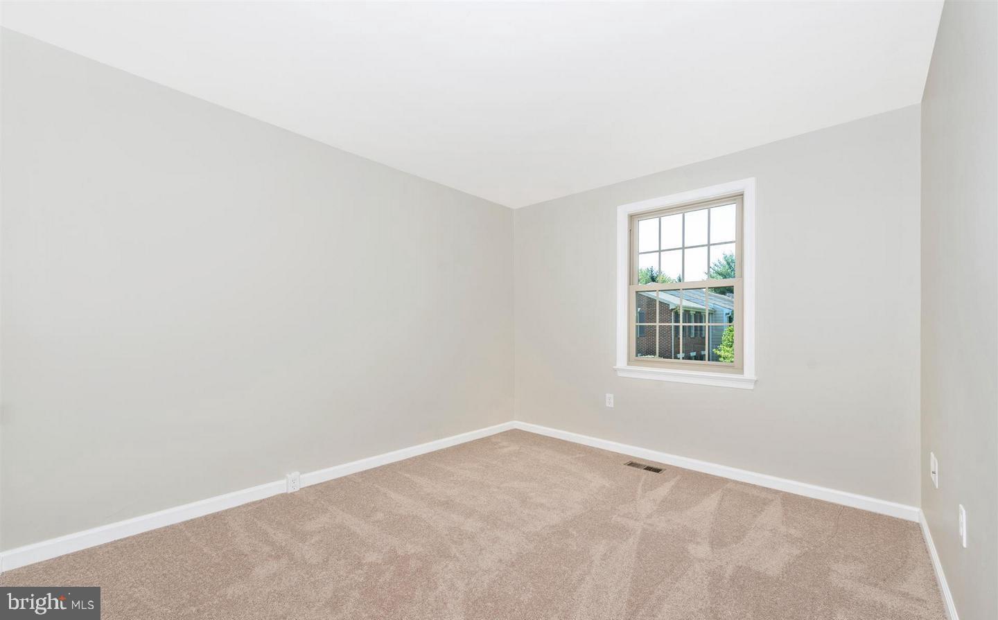 8220 Red Wing Court Frederick, MD 21701 - Photo 12 of 17 an empty room with a window