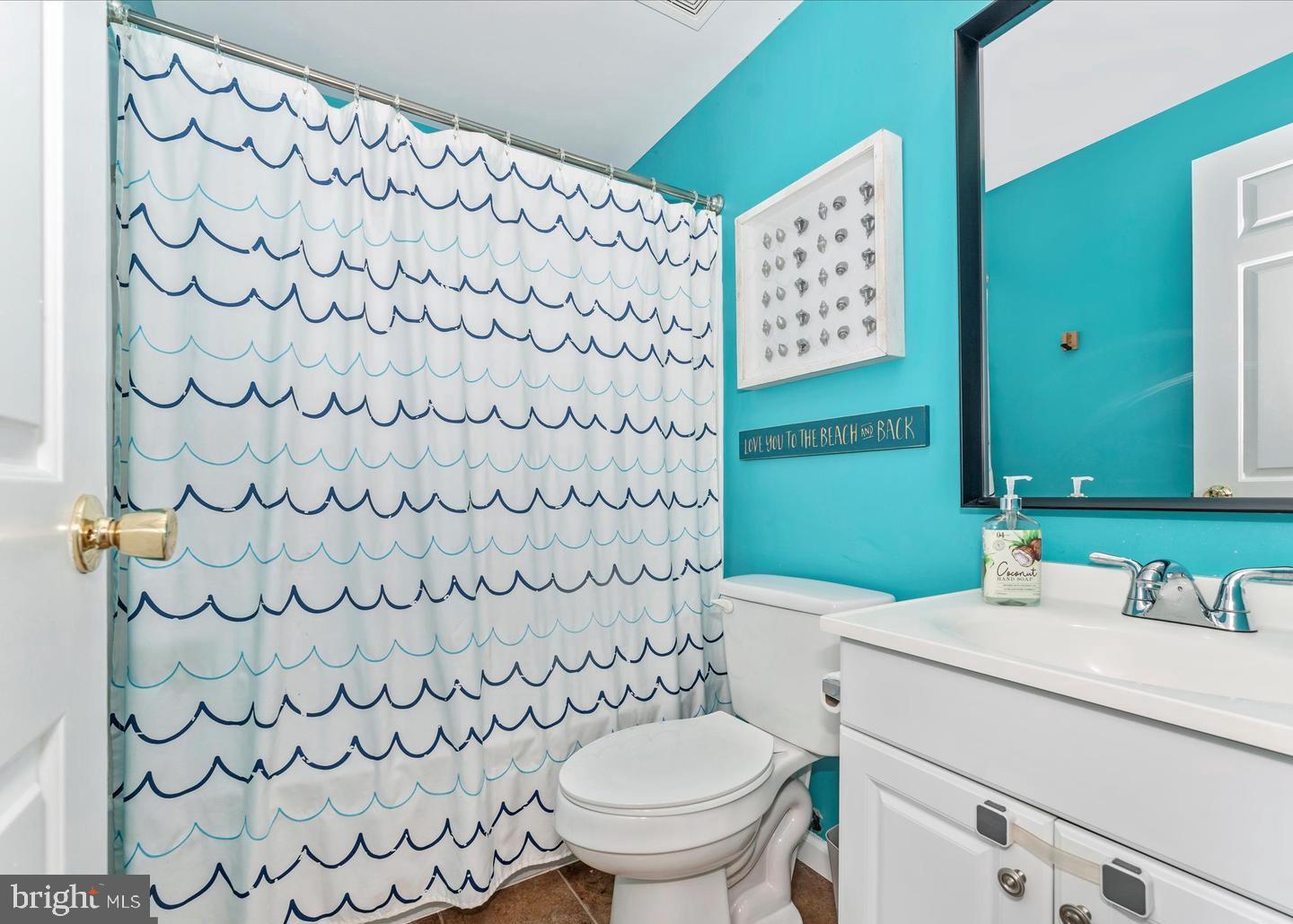 8220 Red Wing Court Frederick, MD 21701 - Photo 13 of 17 a bathroom with a sink and a mirror