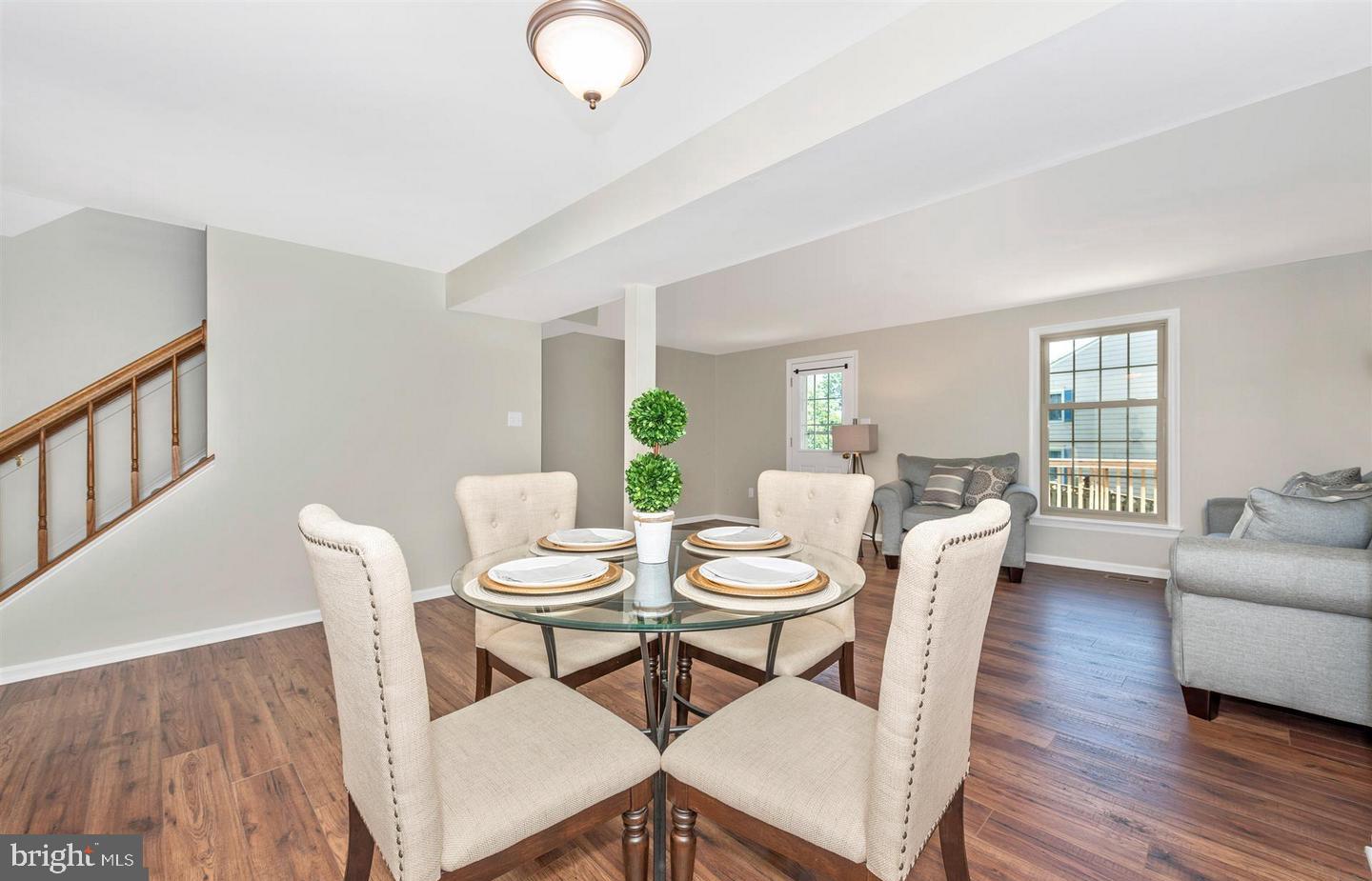 8220 Red Wing Court Frederick, MD 21701 - Photo 5 of 17 a dining room with furniture and wooden floor