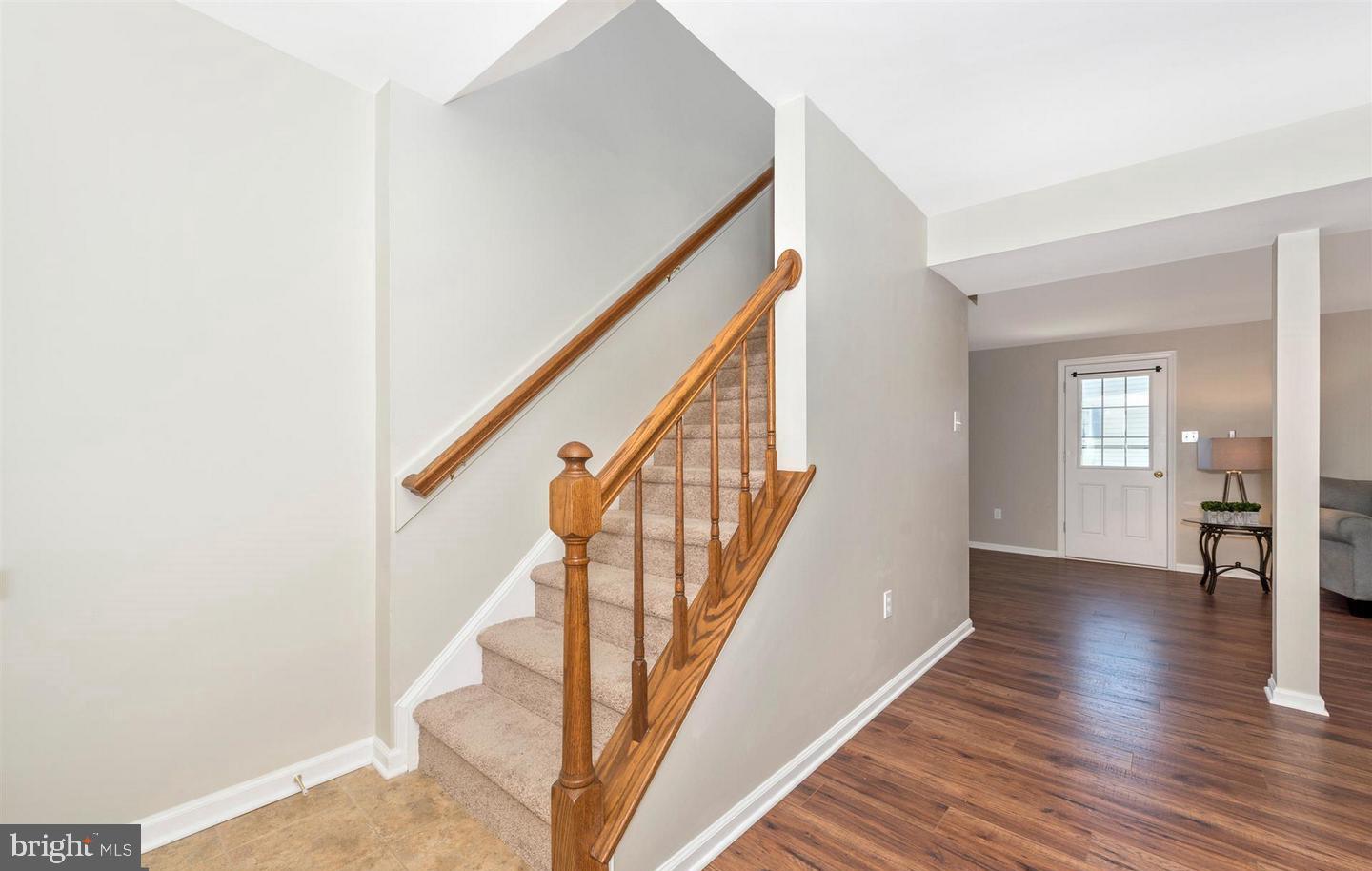 8220 Red Wing Court Frederick, MD 21701 - Photo 9 of 17 a view of an entryway with wooden floor