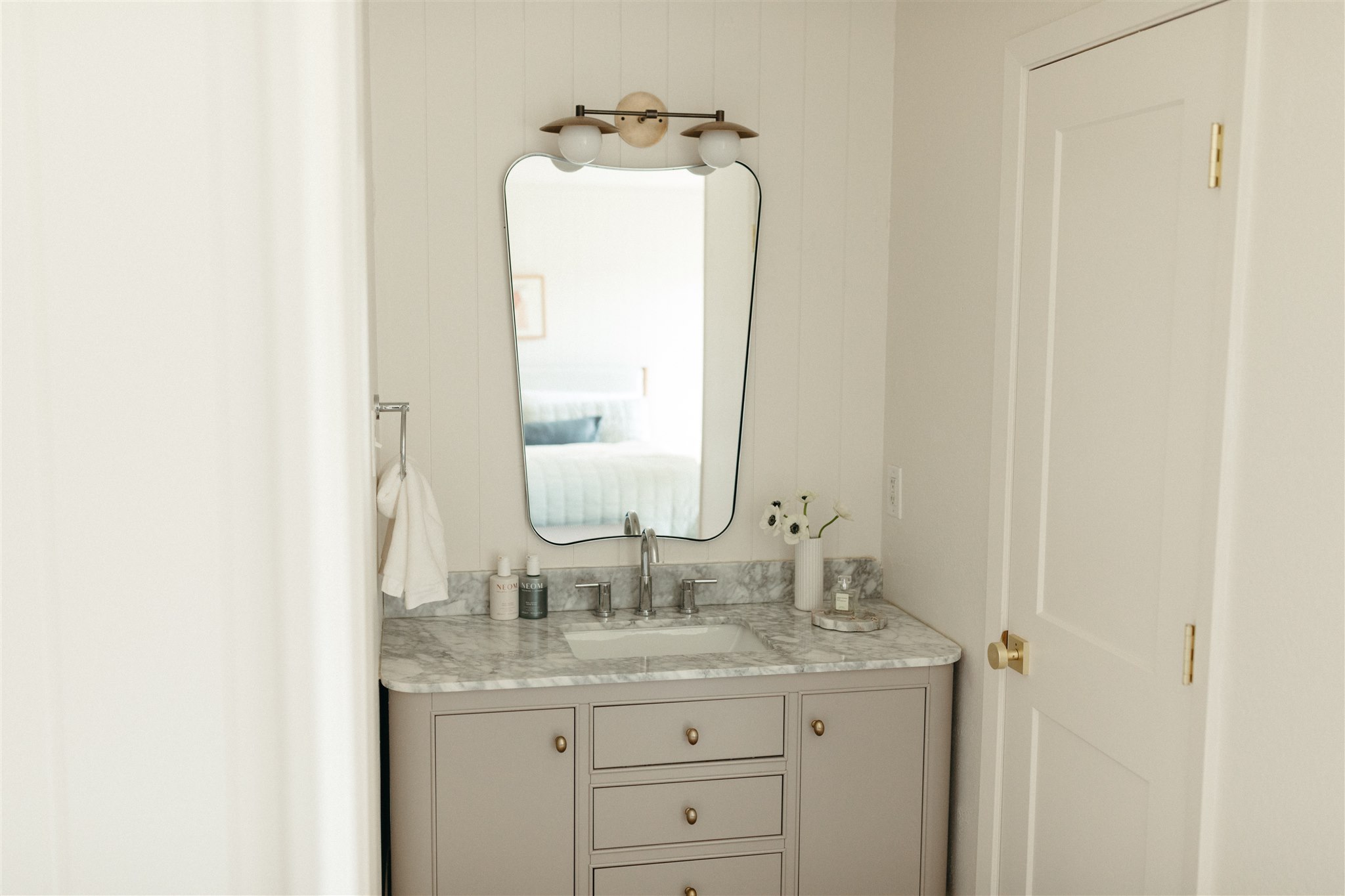 506 Central Drive Georgetown, TX 78628 - Photo 17 of 29 a bathroom with a granite countertop sink and a mirror
