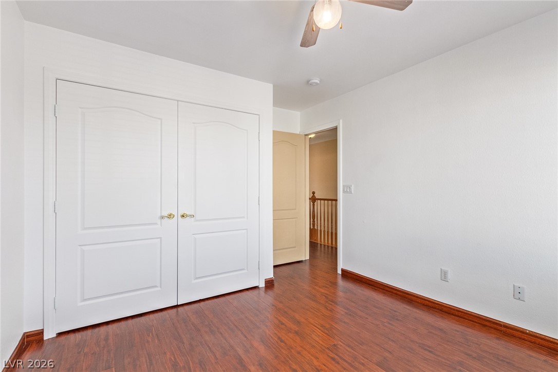 1477 Rancho Ridge Drive Henderson, NV 89012 - Photo 31 of 46 Rich hardwood-style flooring extends throughout this naturally illuminated room, complemented by convenient closet storage.