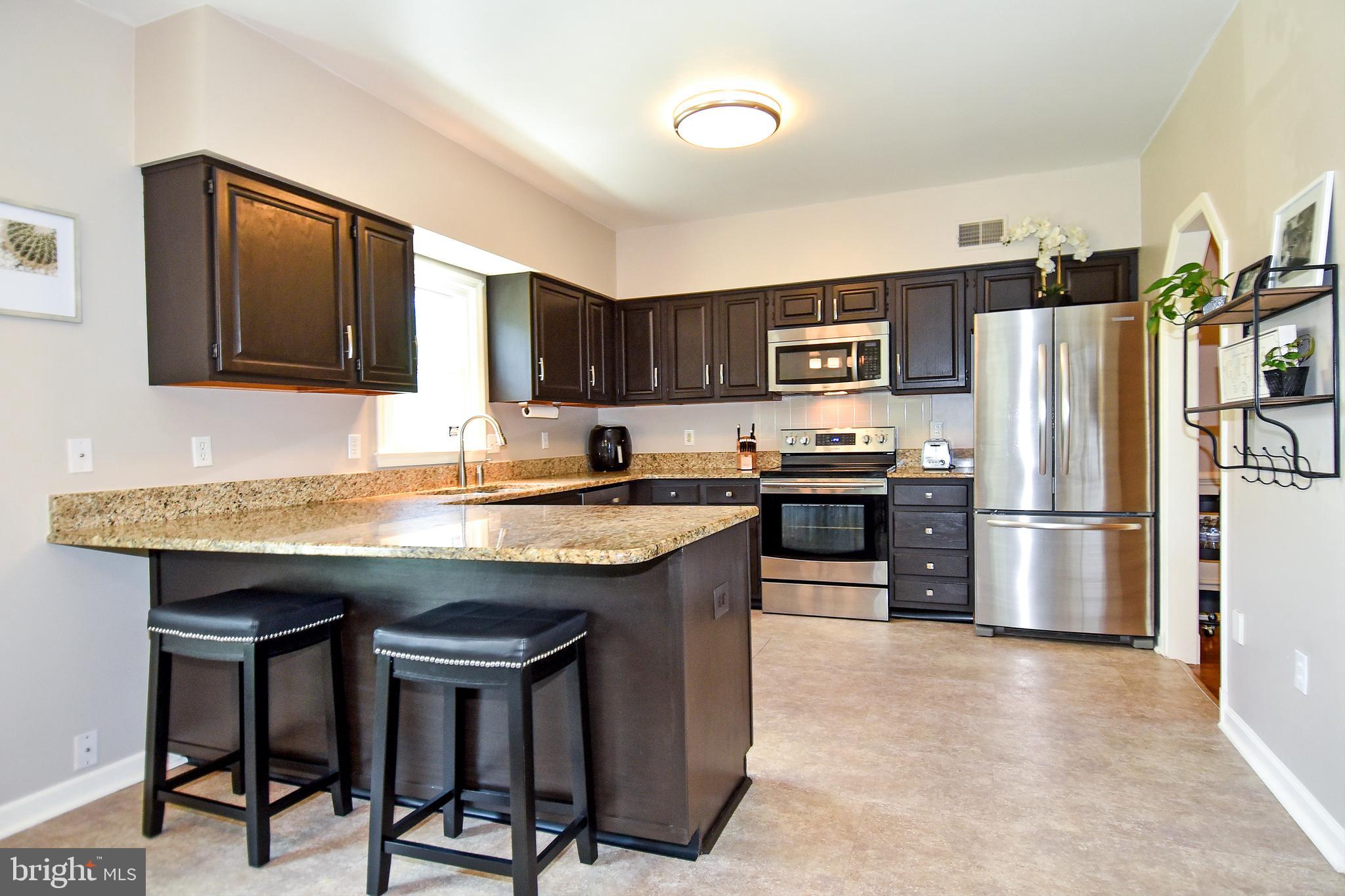 2140 Colonel Way Odenton, MD 21113 - Photo 14 of 49 OPEN KITCHEN WITH BREAKFAST BAR