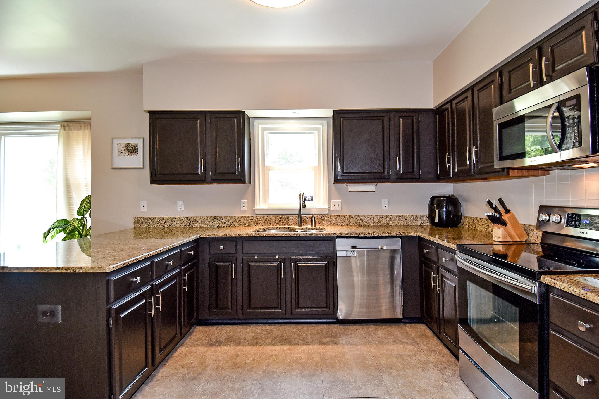 2140 Colonel Way Odenton, MD 21113 - Photo 16 of 49 UPDATED KITCHEN HAS STAINLESS STEEL APPLIANCES
