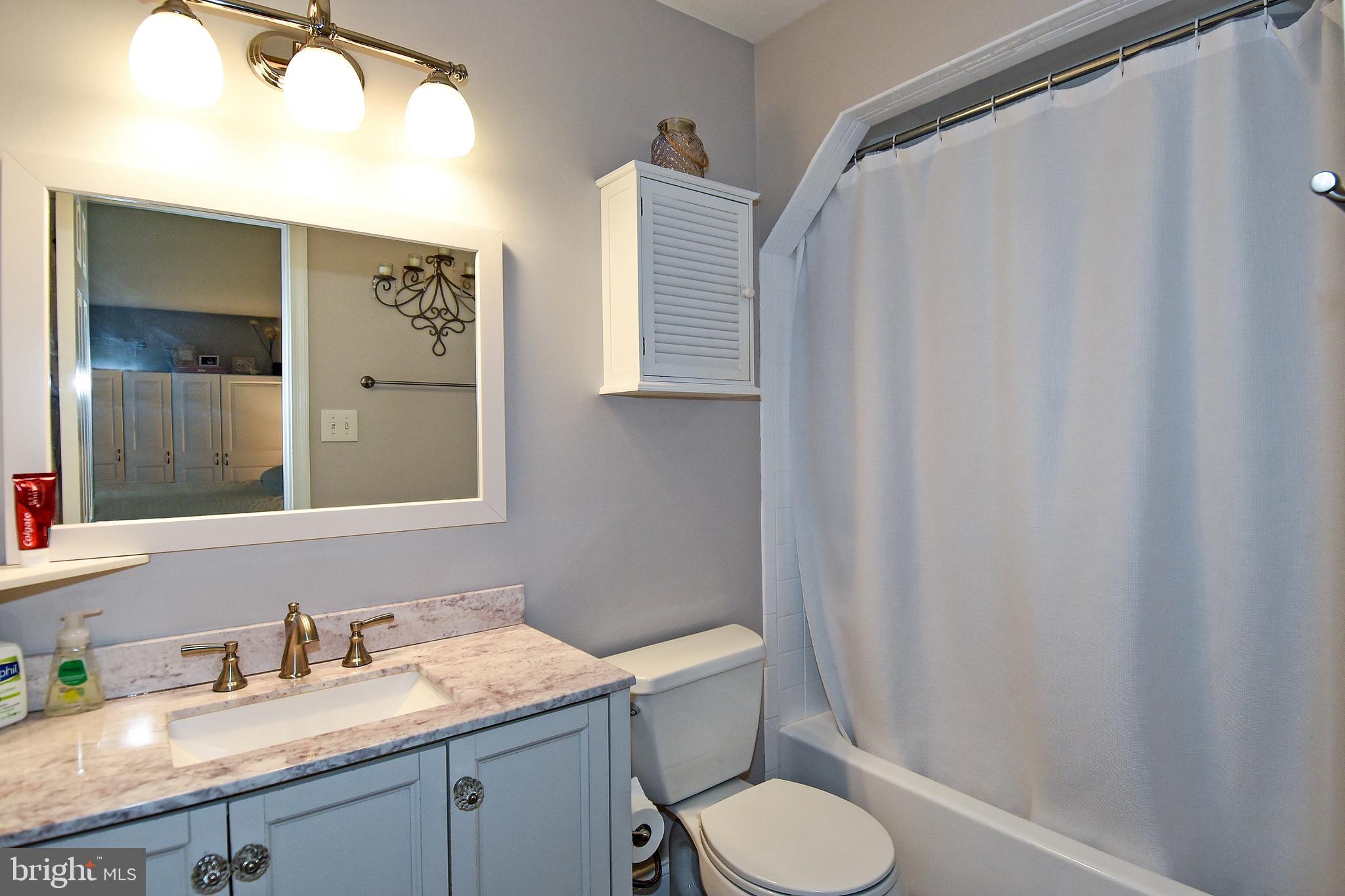 2140 Colonel Way Odenton, MD 21113 - Photo 25 of 49 MASTER BATH HAS UPDATED VANITY AND TUB SHOWER