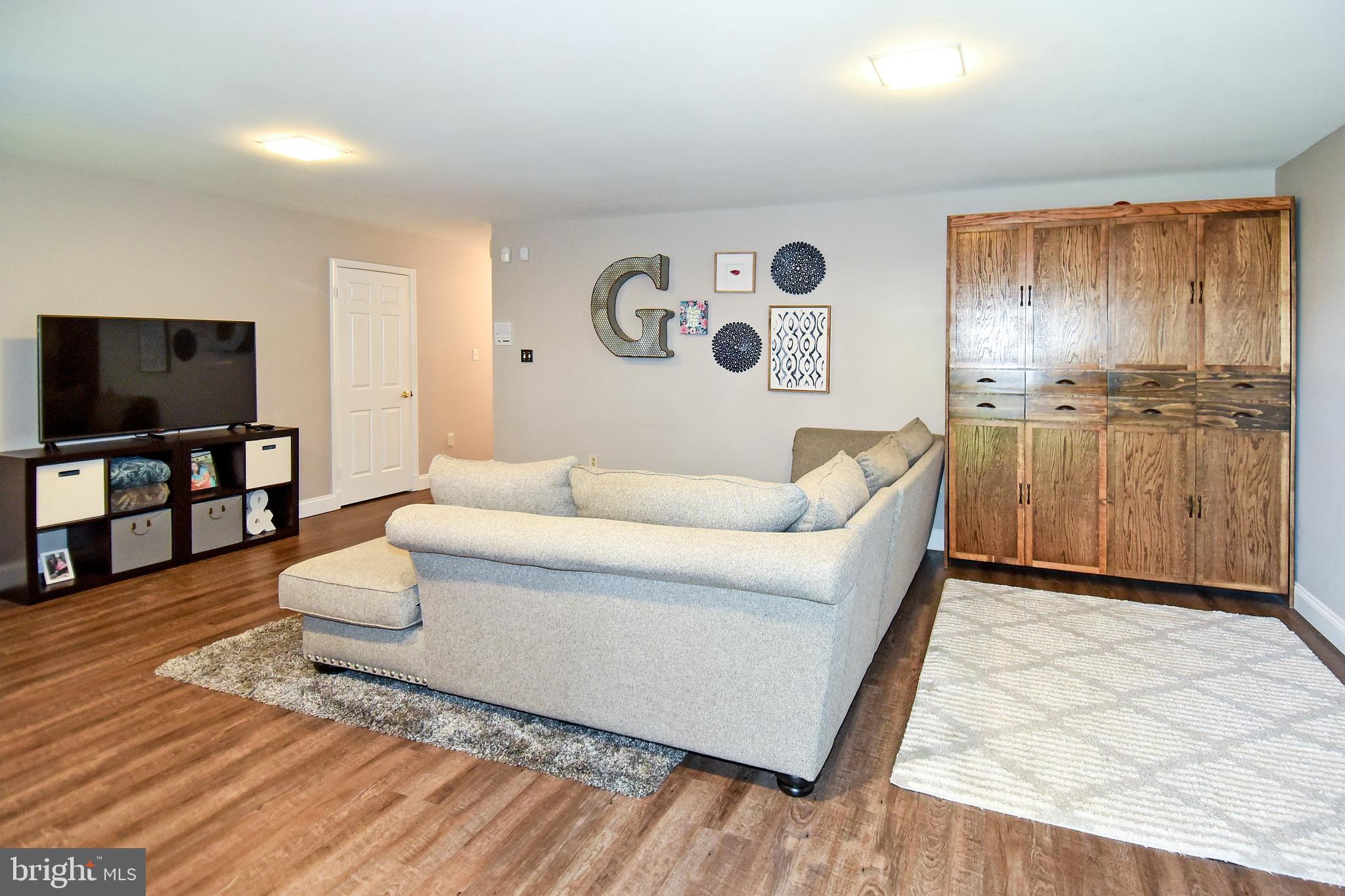 2140 Colonel Way Odenton, MD 21113 - Photo 38 of 49 LOWER LEVEL FAMILY ROOM