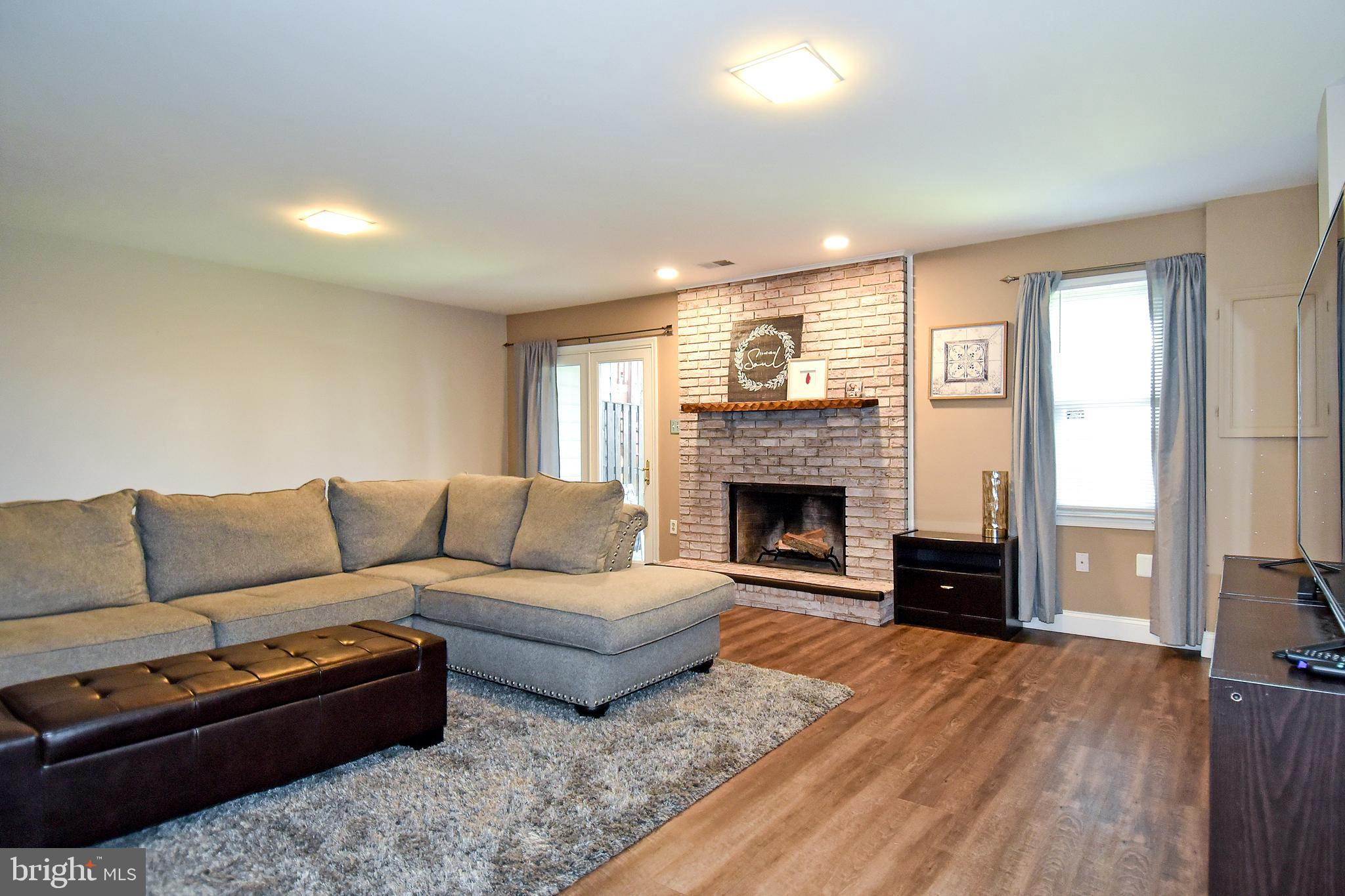 2140 Colonel Way Odenton, MD 21113 - Photo 40 of 49 LL HAS FIREPLACE AND ACCESS TO REAR FENCED IN YARD