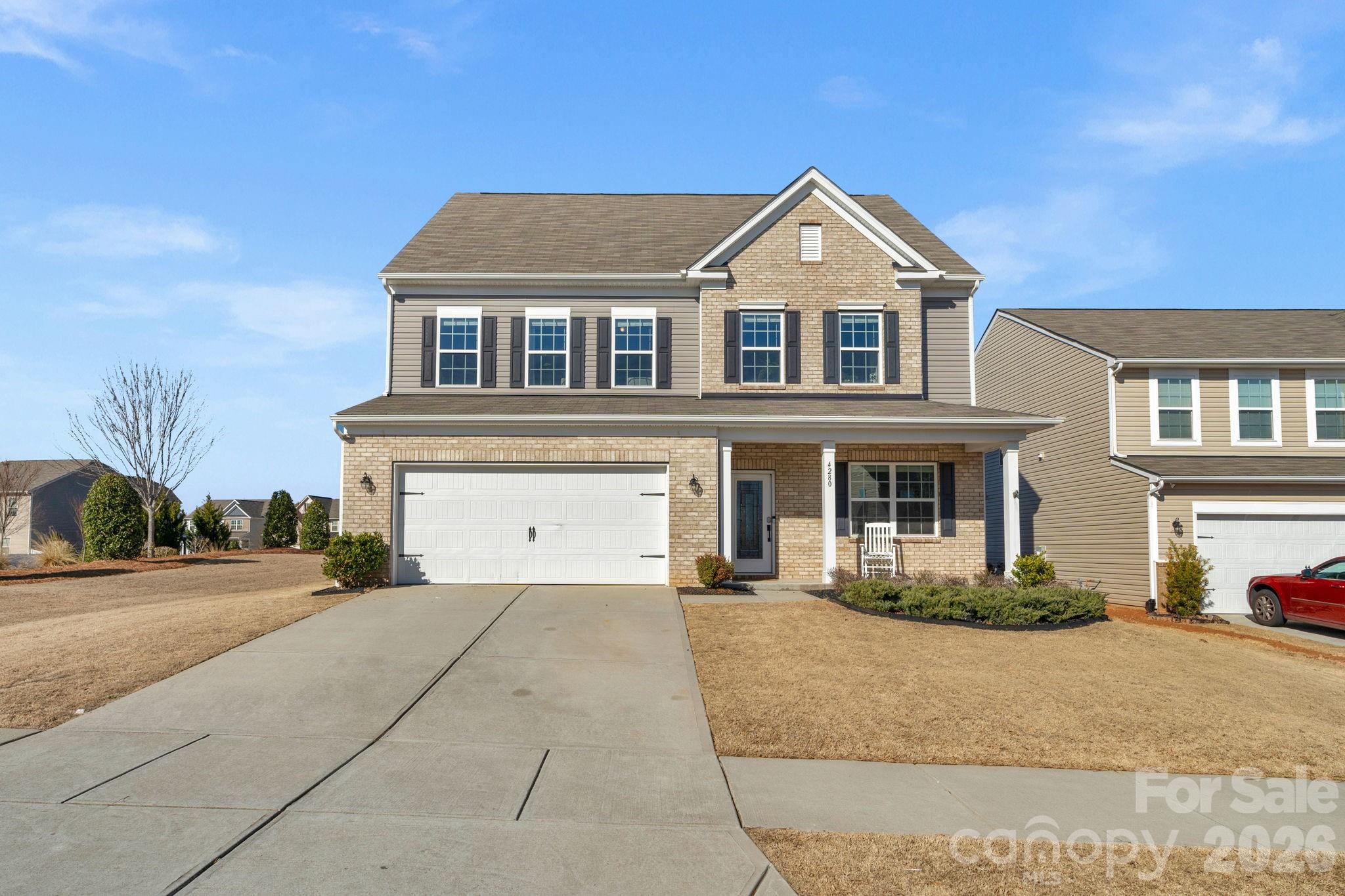 4280 Coachwhip Avenue Lancaster, SC 29720 - Photo 1 of 48 a front view of a house with a yard