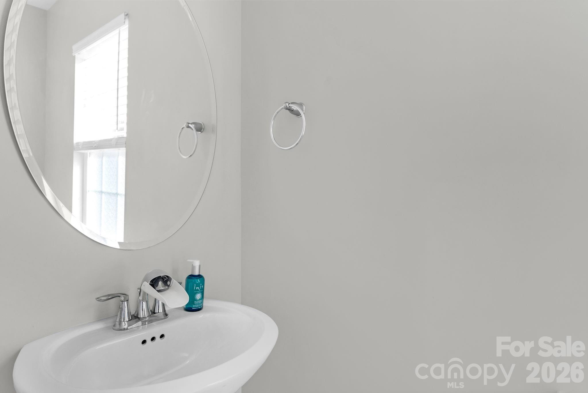 4280 Coachwhip Avenue Lancaster, SC 29720 - Photo 20 of 48 a bathroom with a sink and a mirror