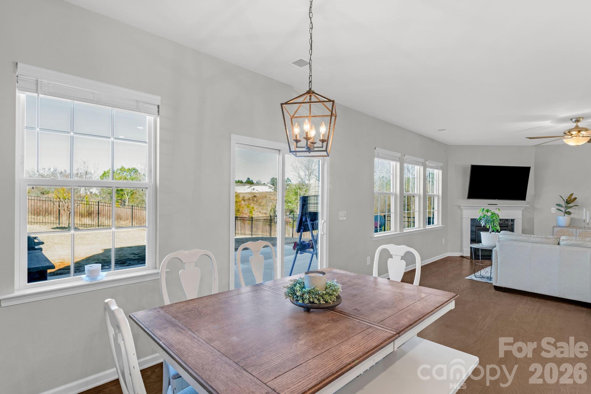 4280 Coachwhip Avenue Lancaster, SC 29720 - Photo 21 of 48 a view of a dining room with furniture and wooden floor