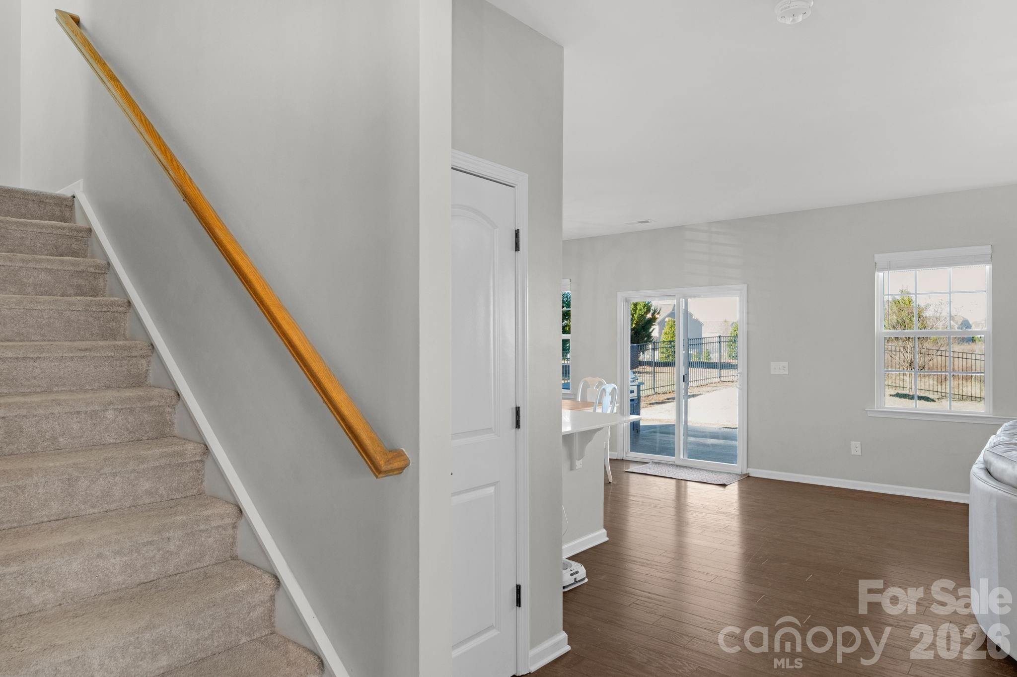 4280 Coachwhip Avenue Lancaster, SC 29720 - Photo 23 of 48 a view of a hallway with wooden floor and staircase