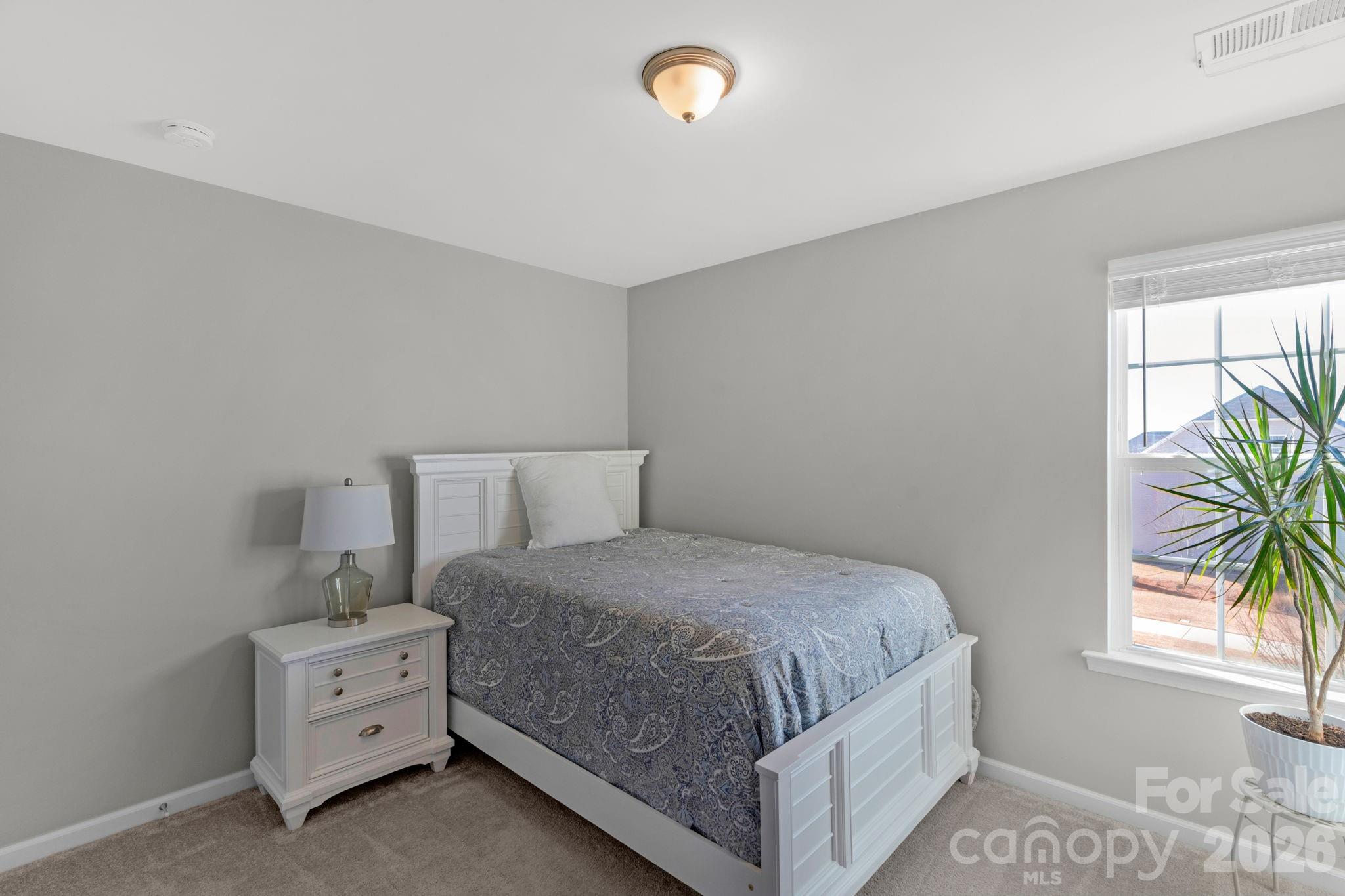 4280 Coachwhip Avenue Lancaster, SC 29720 - Photo 33 of 48 a bedroom with a bed and a window