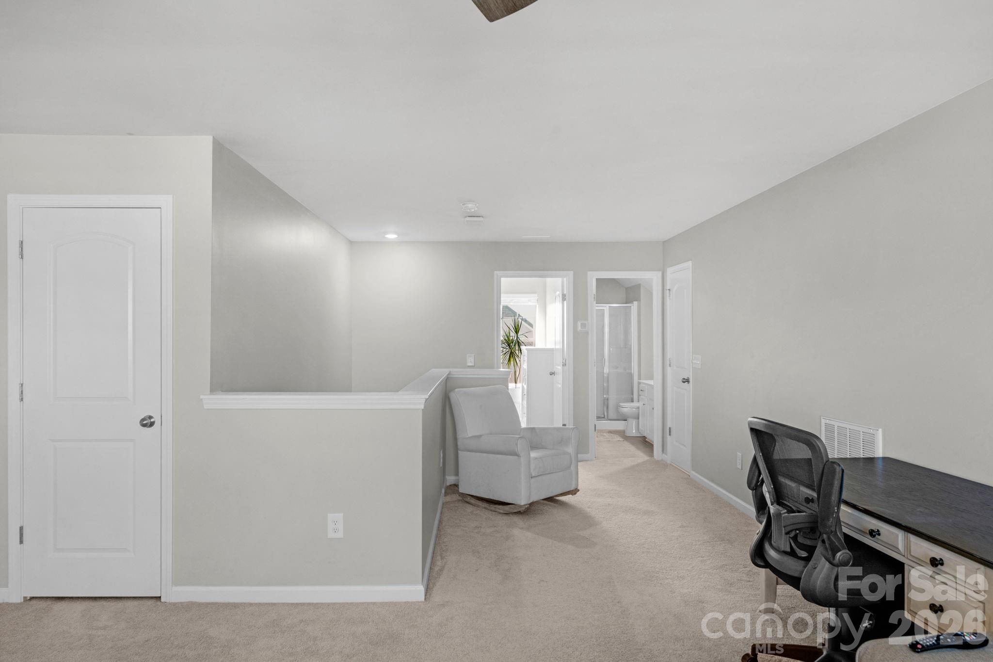 4280 Coachwhip Avenue Lancaster, SC 29720 - Photo 36 of 48 a living room with furniture and a wooden floor
