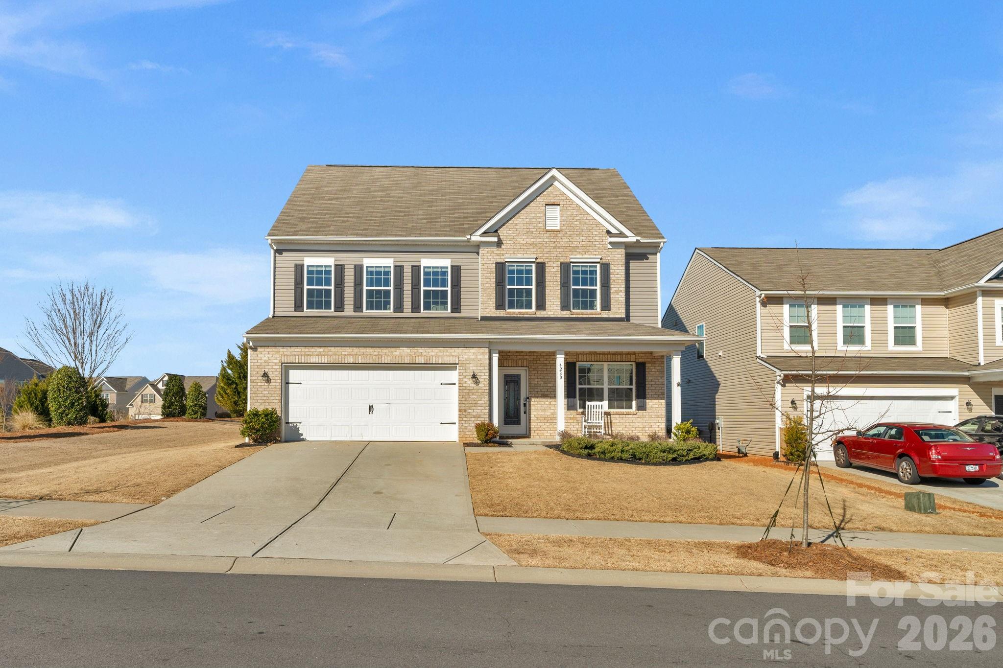 4280 Coachwhip Avenue Lancaster, SC 29720 - Photo 38 of 48 a front view of a house with a garden