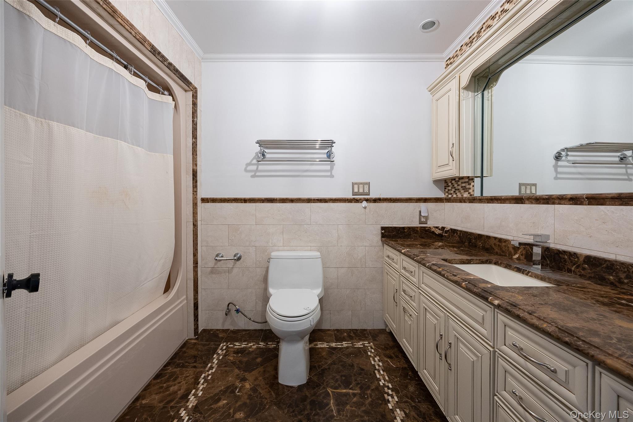 921 West Dover Road Pawling, NY 12564 - Photo 17 of 36 Bathroom featuring a large vanity with a brown stone countertop, integrated rectangular sink, and chrome faucet