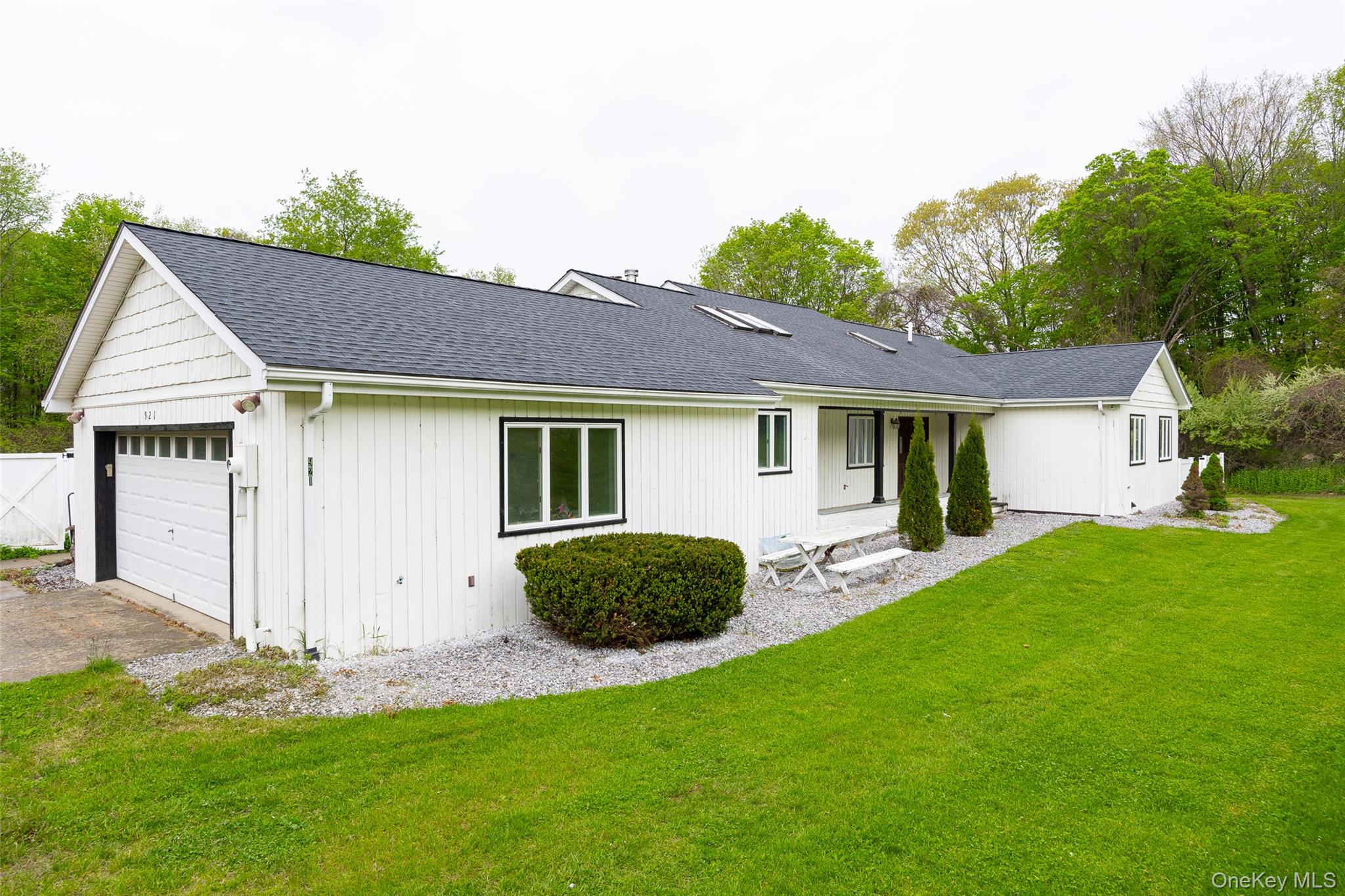 921 West Dover Road Pawling, NY 12564 - Photo 2 of 36 Single-story residence featuring white vertical siding and a dark shingle roof