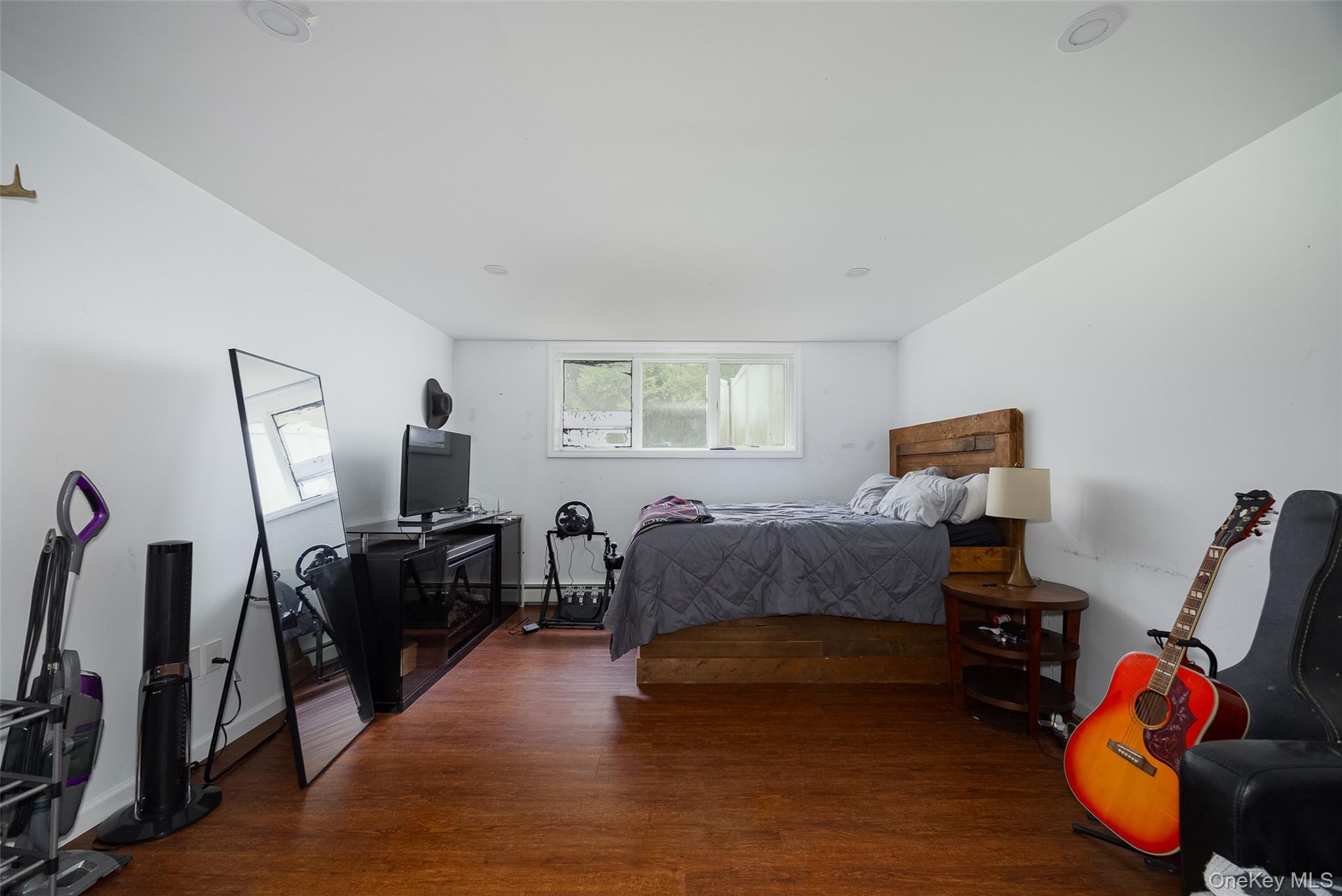 921 West Dover Road Pawling, NY 12564 - Photo 24 of 36 Spacious room featuring wood-finish flooring, white painted walls, and recessed lighting