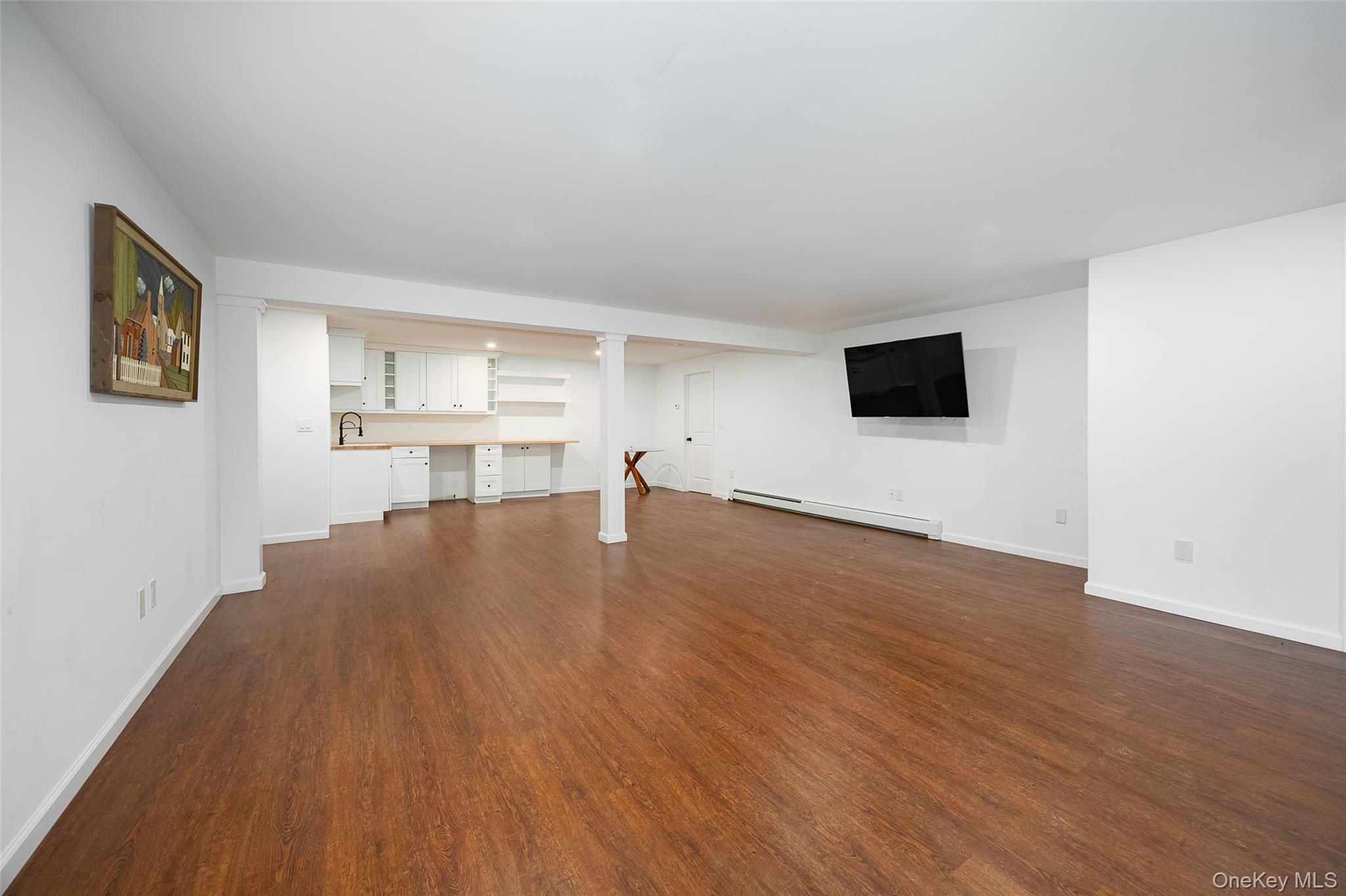 921 West Dover Road Pawling, NY 12564 - Photo 27 of 36 Spacious finished room featuring warm wood-finish flooring, crisp white walls, and recessed lighting