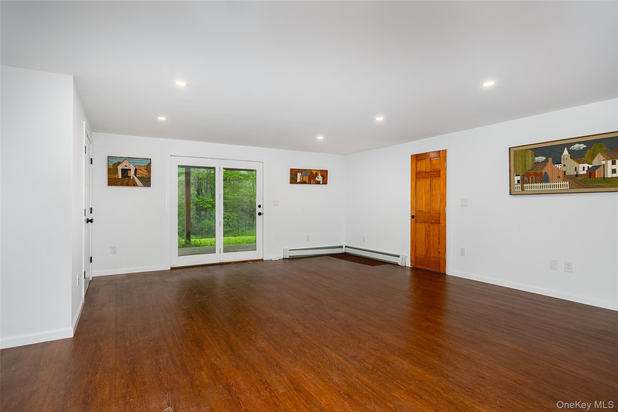 921 West Dover Road Pawling, NY 12564 - Photo 29 of 36 Spacious room featuring wood-finish flooring, recessed lighting, and white baseboards