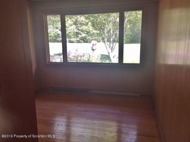 1470 Aberdeen Road Moscow, PA 18444 - Photo 8 of 15 a view of small space with wooden floor and windows