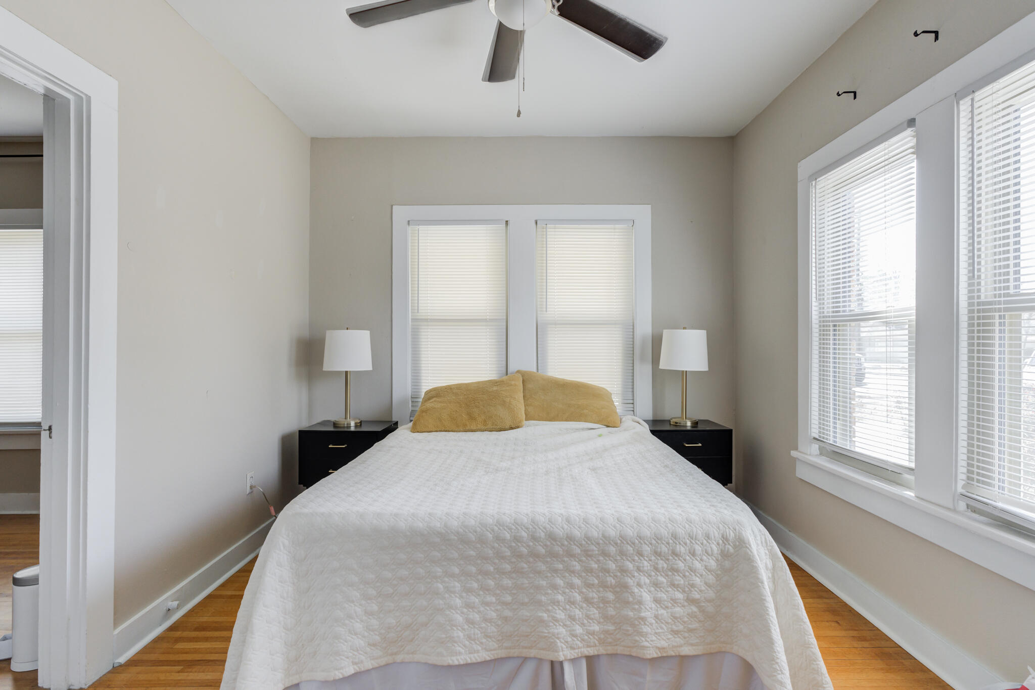 2606 22nd Street Lubbock, TX 79410 - Photo 15 of 24 a bedroom with a bed and a large window