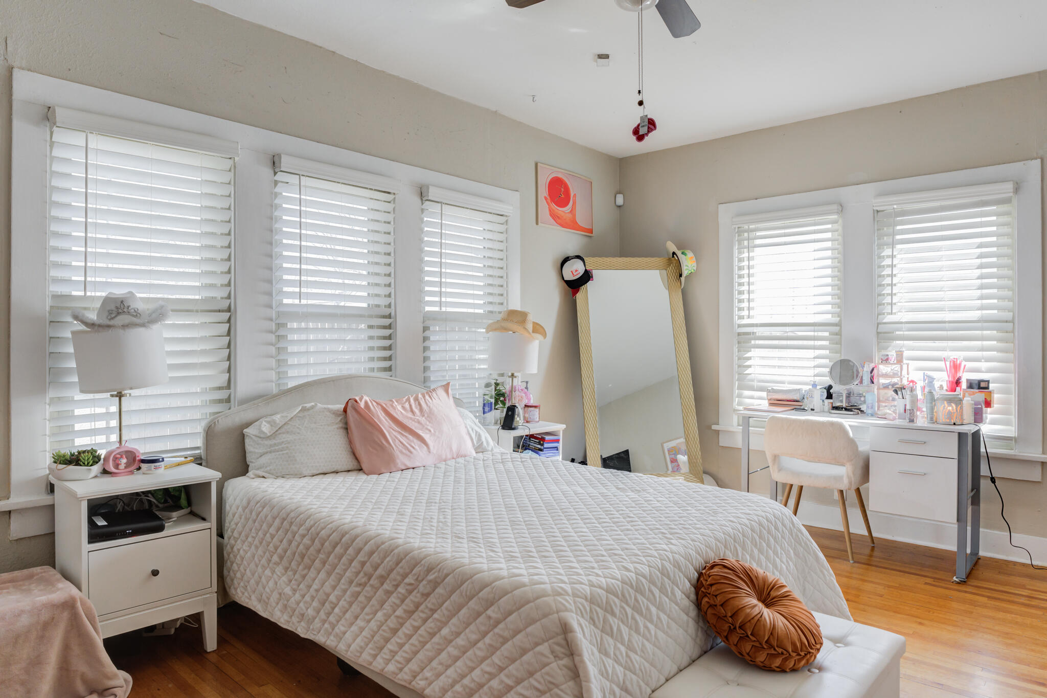 2606 22nd Street Lubbock, TX 79410 - Photo 21 of 24 a bedroom with a bed and a large window