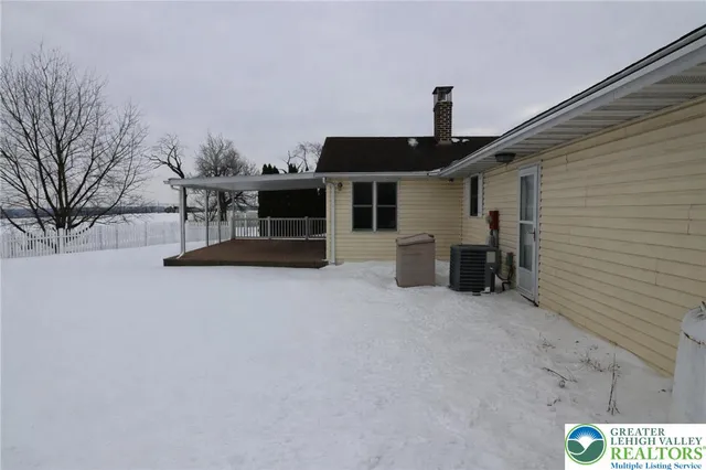 a front view of a house with a porch