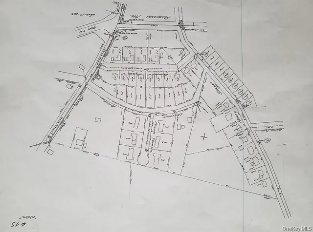 a white house with white walls and wooden floor