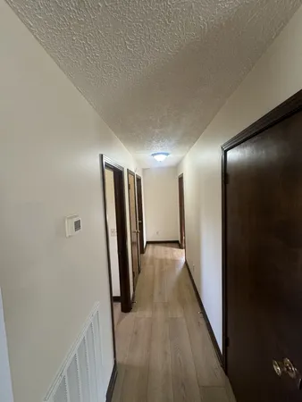 a view of hallway with stairs