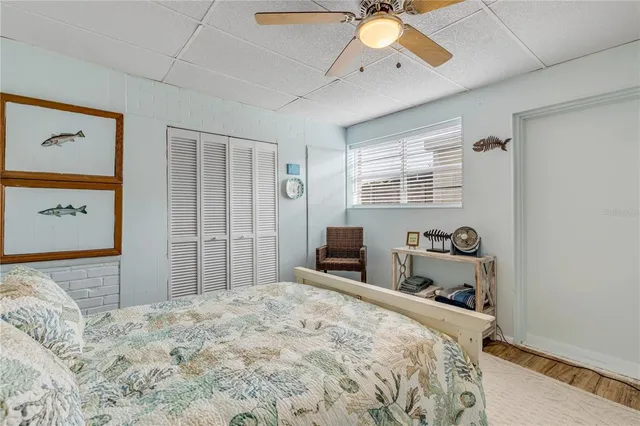 a living room with furniture a rug and a table