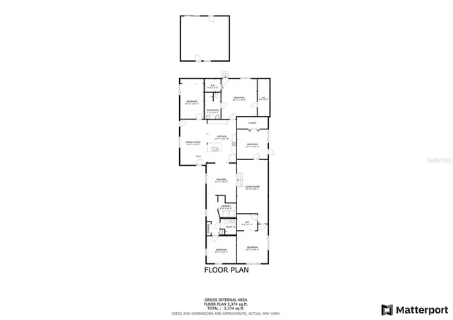 a front view of a house with a garden and trees