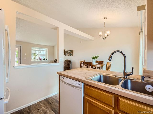a bedroom with two beds and a window