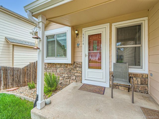 a front view of a house with a porch
