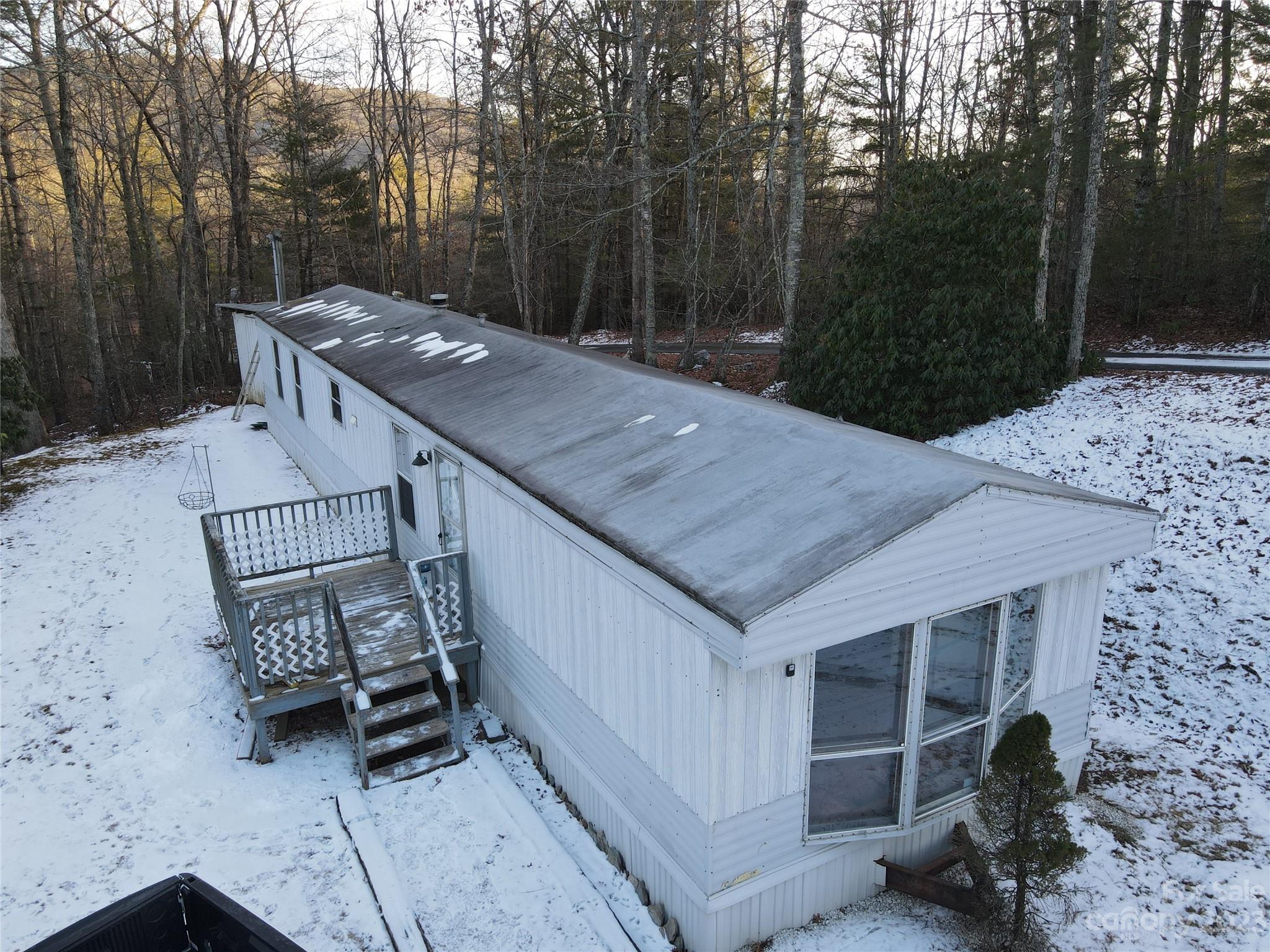 591 Pine Run Ridge Spruce Pine, NC 28777 - Photo 1 of 19 a view of a patio with a table and chairs