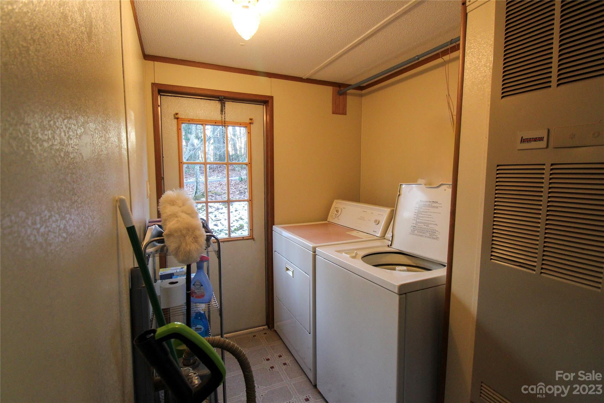 591 Pine Run Ridge Spruce Pine, NC 28777 - Photo 11 of 19 a room with storage and utility