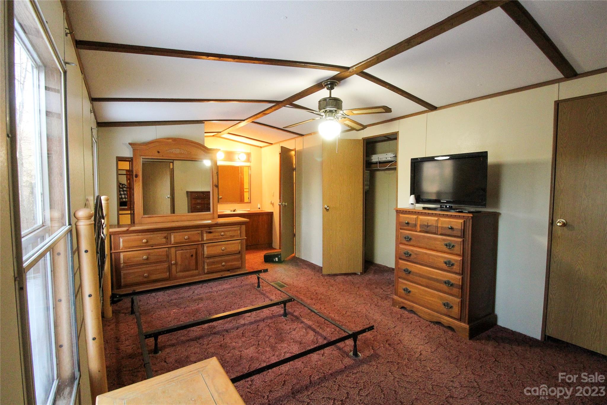 591 Pine Run Ridge Spruce Pine, NC 28777 - Photo 6 of 19 a view of room with furniture and a flat screen tv