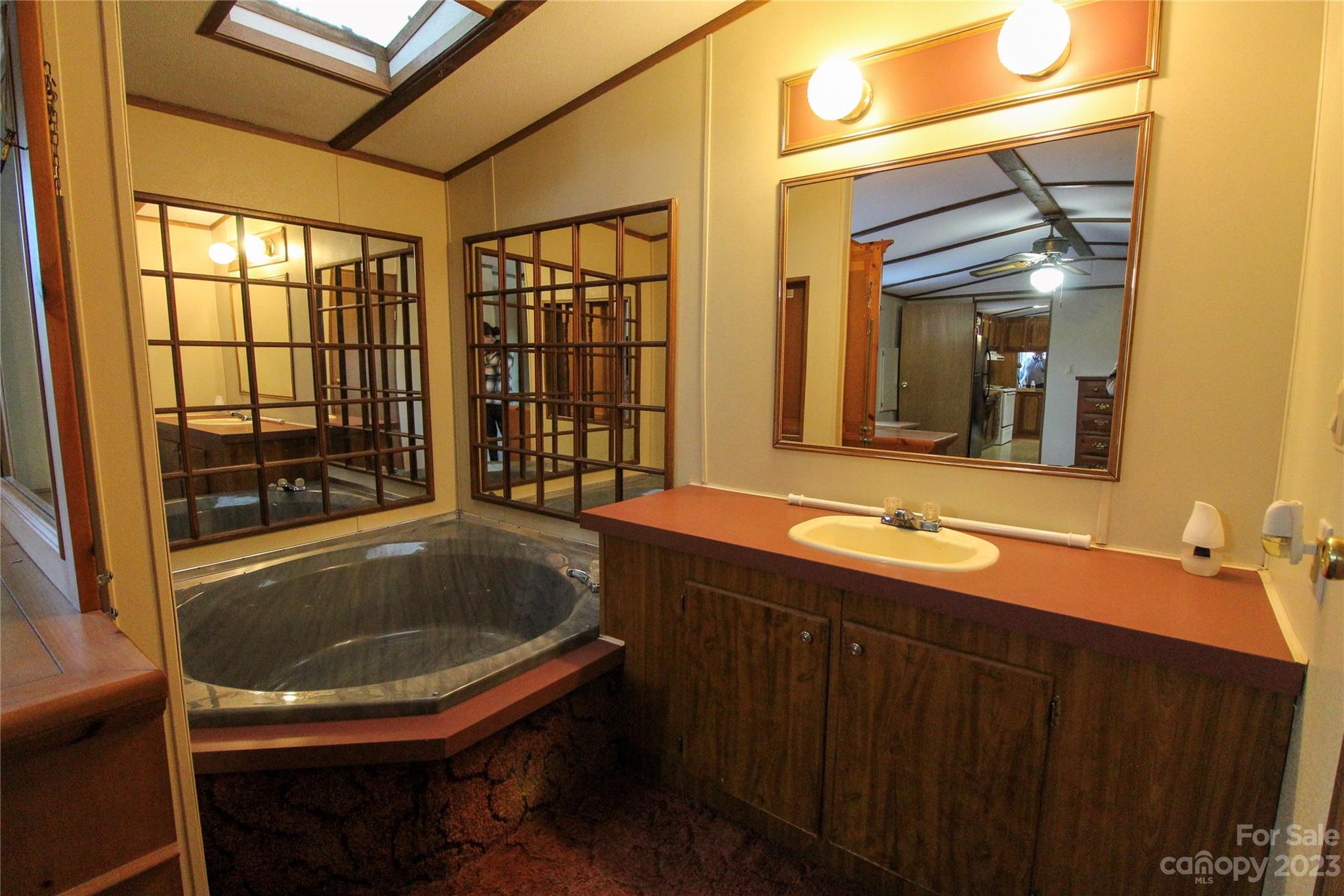 591 Pine Run Ridge Spruce Pine, NC 28777 - Photo 7 of 19 a bathroom with a sink a toilet and shower